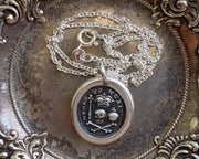 skull and bones wax seal pendant