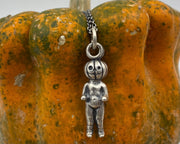 pumpkin head doll pendant