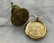 gold skull wax seal necklace