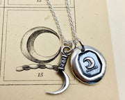 scythe and crescent moon necklace