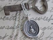 snail wax seal necklace
