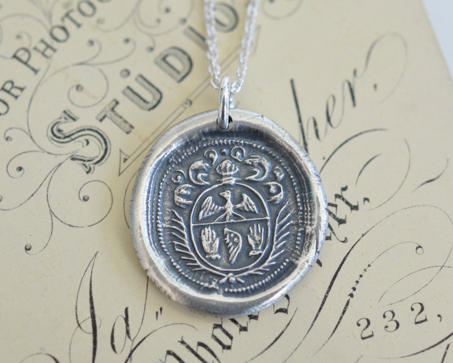 two hands and wings wax seal necklace - soar on the wind - family