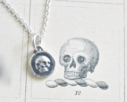 tiny skull wax seal necklace