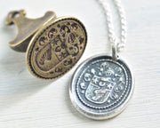 wing crest wax seal jewelry